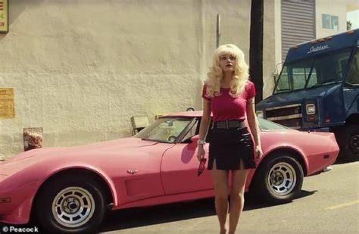Angelyne steps out in plunging mini dress as trailer released for