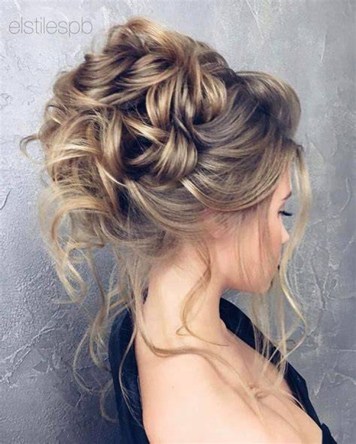 beautiful updo with bows in the front Natural hair styles for black