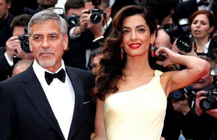 Clooney to sue Voici over images of twins YouTube