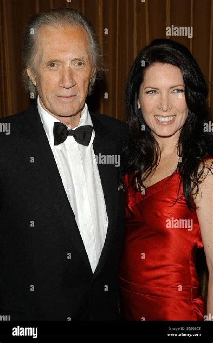 David Carradine and wife arriving at the "KILL BILL VOL.1 PREMIERE" at