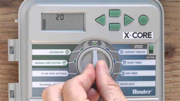 How do i program my hunter xcore sprinkler system