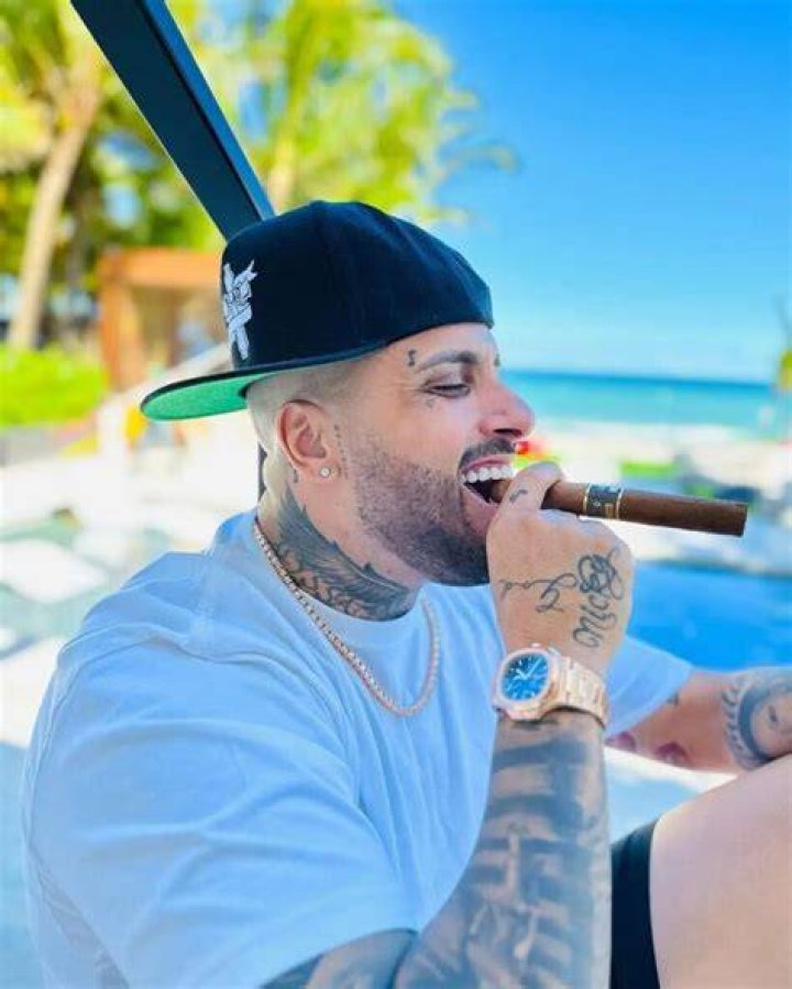 Nicky Jam Spotted Wearing Patek Philippe Travel Time Superwatch