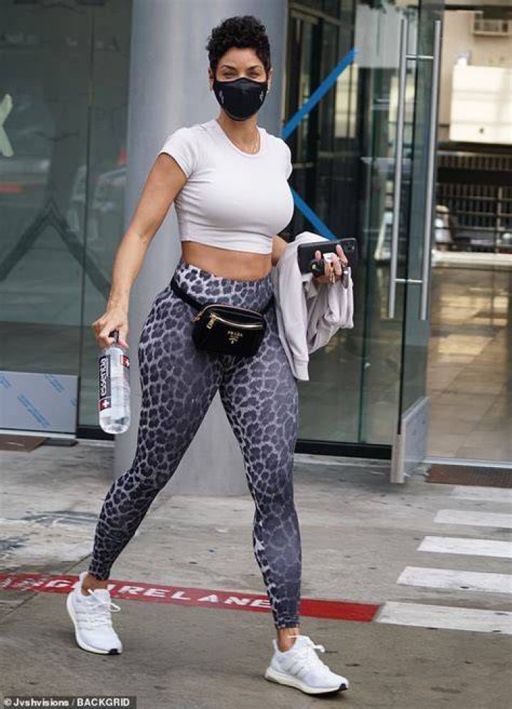 Nicole Murphy places her sculpted curves on full display as she leaves
