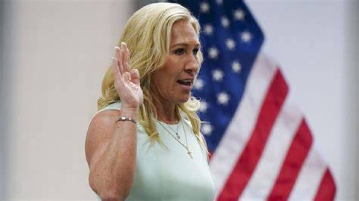 officials rule that Marjorie Taylor Greene can remain on the