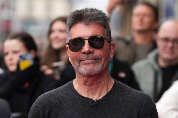 Simon Cowell makes a rare public appearance with his son Eric, nine