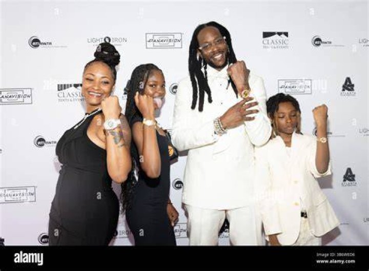 Tauheed “2Chainz” Epps, 41, with his beautiful wife and three children