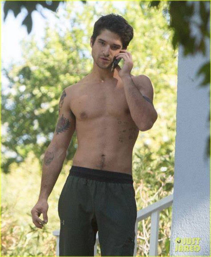 Tyler Posey Goes Shirtless as He Works on His Motorcycle! Photo