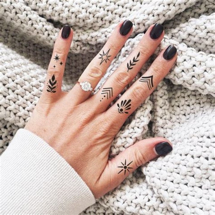 Unique Finger Tattoos